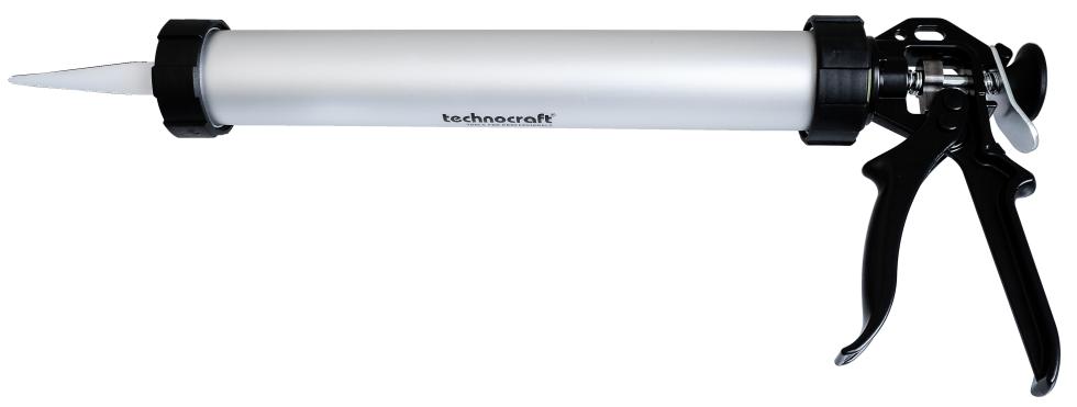 Schlauchbeutelpistole mit festem Alugehäuse, schwarz lackiertem Griffstück und Düsenabschlussdeckel, sowie weisser Kunststoffdüse, Ansicht waagerecht liegend von der Seite